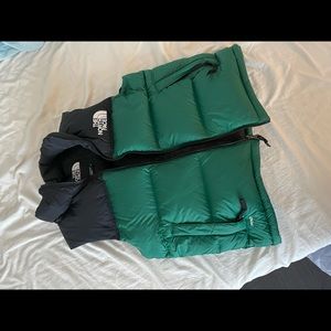 The north face Insulated vest size m( fit s too